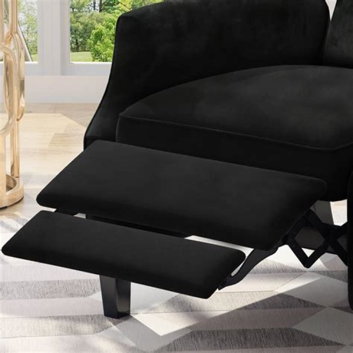Should your feet hang off a recliner?
